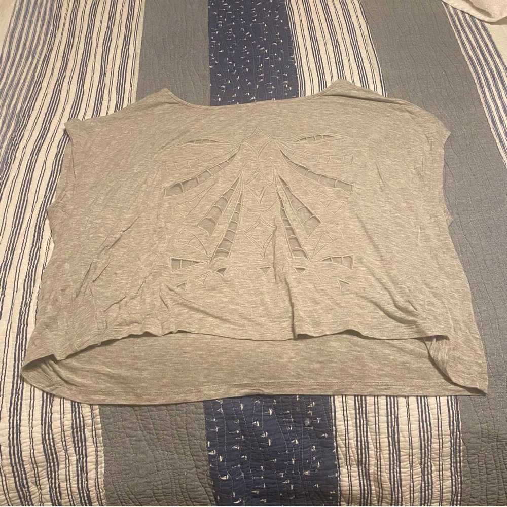 Grey cut out shirt from Cato. Some pieces mesh.